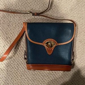Dooney & Bourke Navy and tan equestrian style crossbody bag